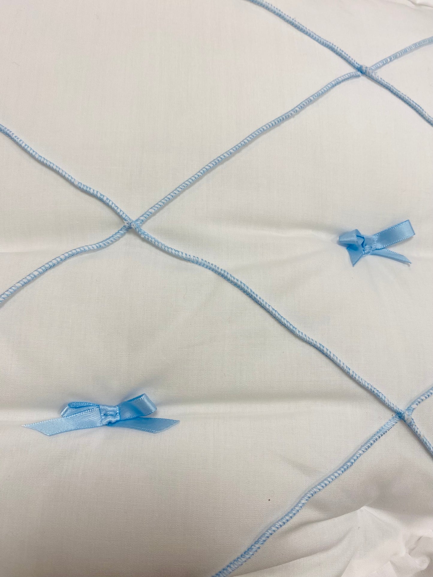 White/Blue Bow Cross Cosytoes